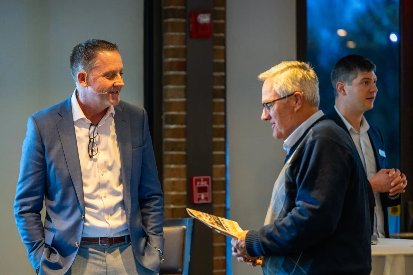 An advisor talking with clients